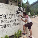 painting goodtime hostel sign