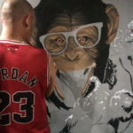 hostel painting monkey with sunglasses